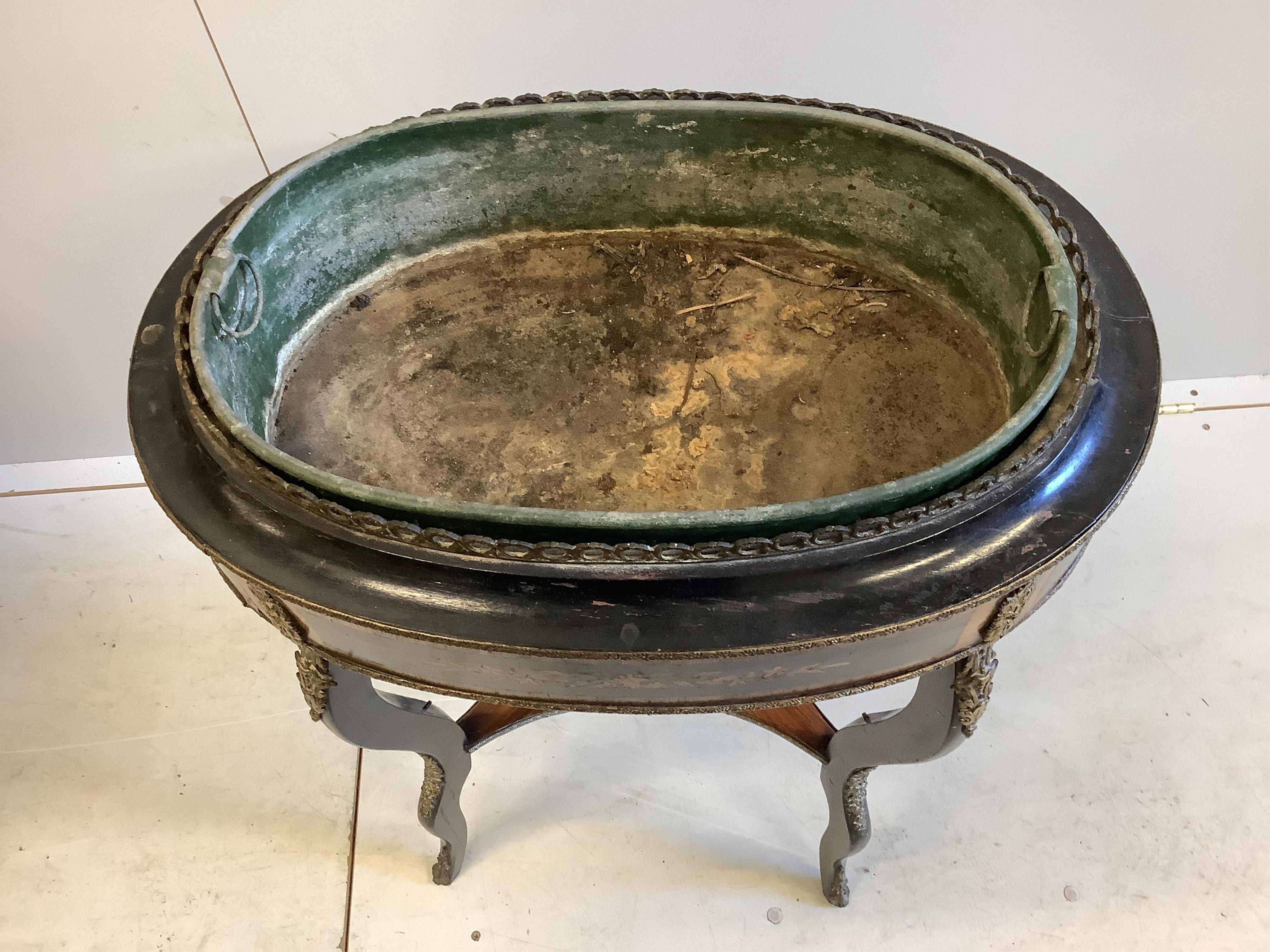 A mid 19th century French ebonised, kingwood and floral marquetry inlaid jardiniere table, width 58cm, depth 38cm, height 85cm. Condition - poor